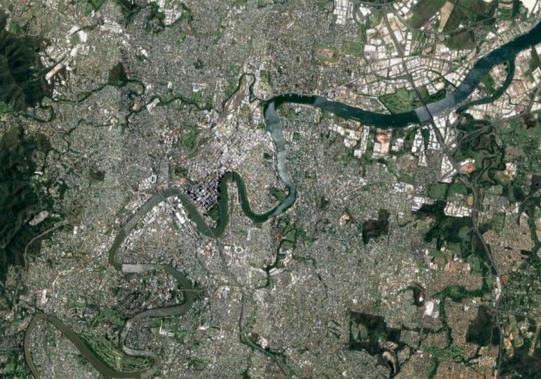 Aerial view over Brisbane showing the river and built up environments