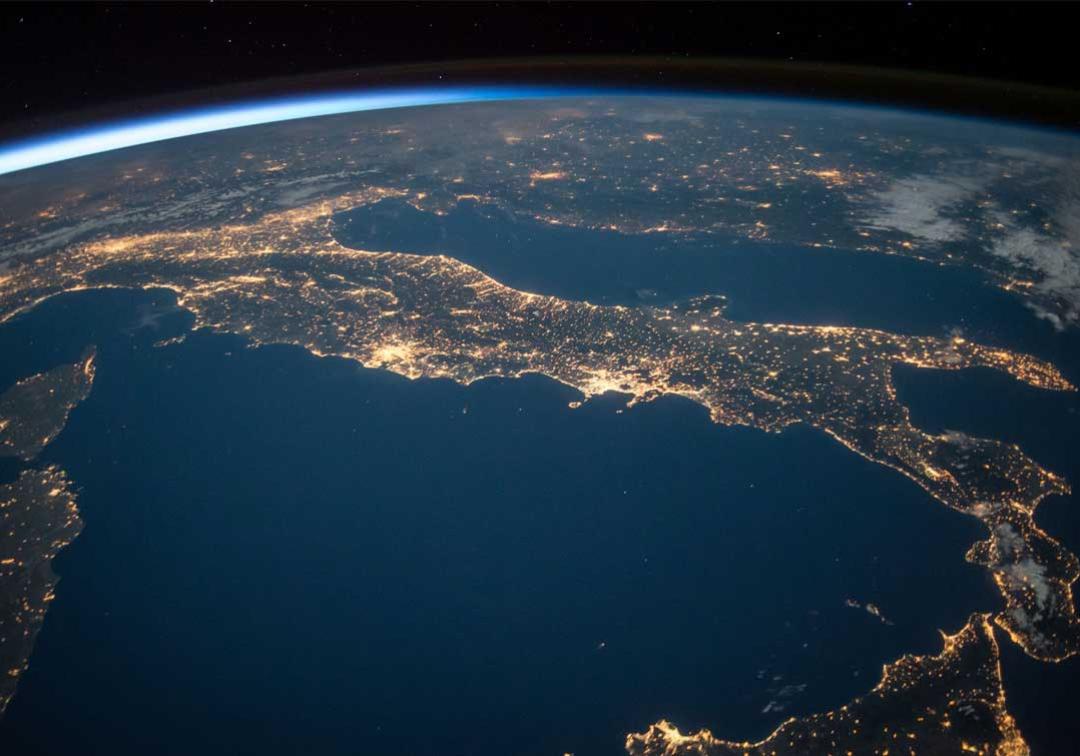 Aerial view of the earth from space with lights sparkling over Europe
