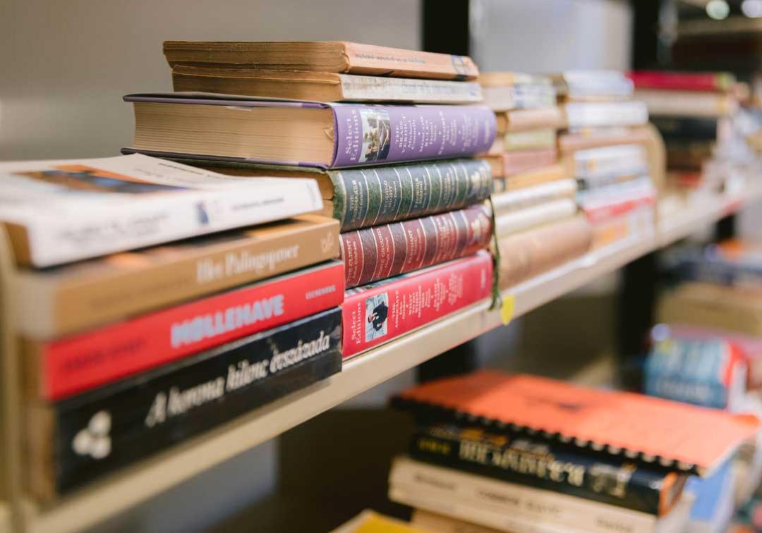 Rows of bookshelves and book spines in close up