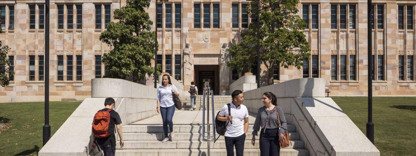 Students on the steps outside UQ Law buildings