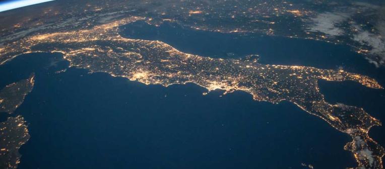 Aerial view of the earth from space with lights sparkling over Europe