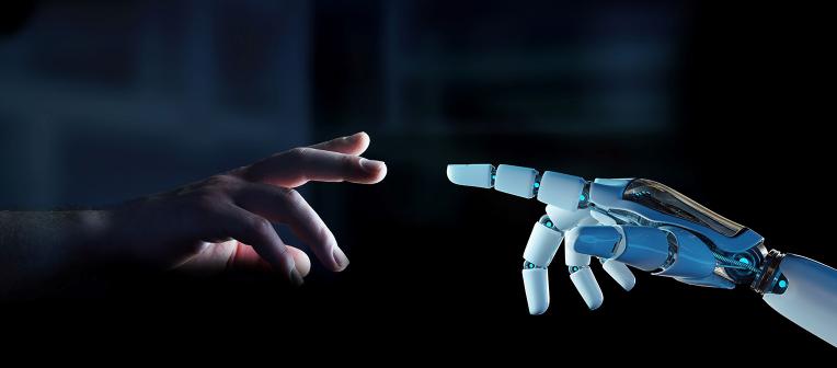 A human hand reaches towards a robotic hand, fingers extended.