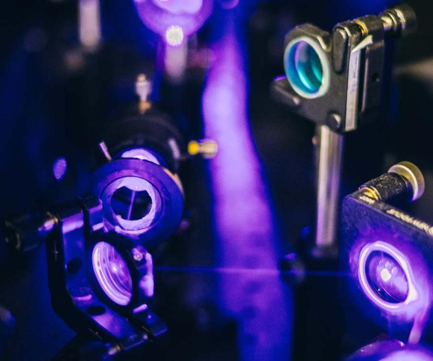 Close up of quantum machinery with purple light surrounding it