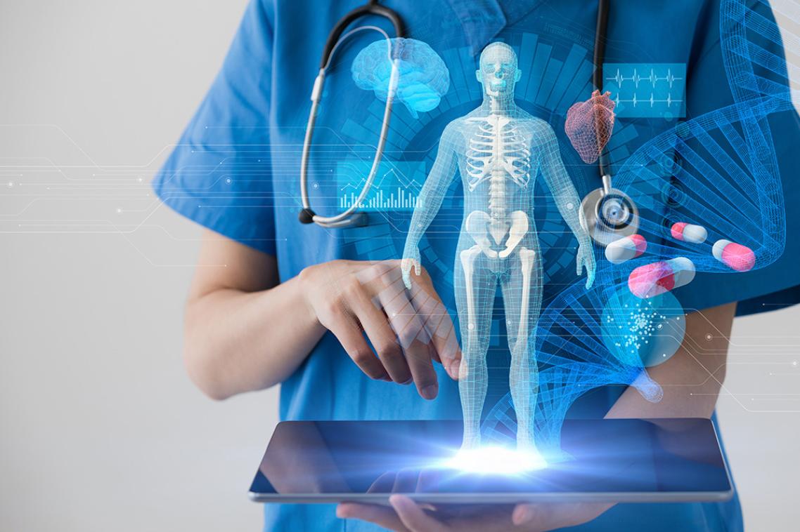 A person wearing scrubs and a stethoscope holds an iPad. A graphic of a human skeletal system sits above the screen.